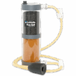 A LaMotte Duo-Soft water filtration device, like the WaterLink Spin Touch DW Sales Demonstration Outfit - 4-3085, features two chambers with black and orange filter media, connected to yellow tubing and a black rubber bulb.