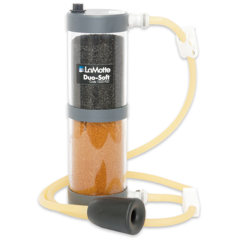A LaMotte Duo-Soft water filtration device, like the WaterLink Spin Touch DW Sales Demonstration Outfit - 4-3085, features two chambers with black and orange filter media, connected to yellow tubing and a black rubber bulb.