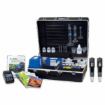 A black carrying case open to reveal a SMART 3 Electronic Soil Lab - 1985-06 kit, including bottles, test tubes, droppers, meters, manuals, and brochures, all neatly organized inside and around the case on a white background.