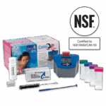 Pool water test kit with a blue ColorQ 2x Home Pool 7 Kit - 2084 device showing pH 7.2, four test tubes with colored lids, a brush, dropper, tablets, instructions, and an NSF certification logo in the top right corner.
