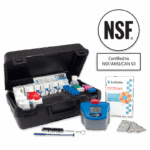 A black carrying case holds ColorQ 2x PRO 9 Plus - 2097 pool test kits, bottles, brushes, and color-coded vials. Next to it are a pool manager booklet, measuring cards, and a digital reader. An NSF certification badge appears above the items.