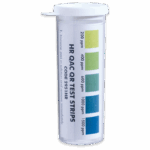 A clear plastic container labeled High Range QAC Test Papers - 2951HR features a color chart displaying five levels from light green to dark blue, marked 200 ppm to 1500 ppm, used for testing chemical concentrations.