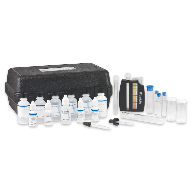 A Laundry Testing Outfit - Model LDR - 3095-02 water testing kit with labeled bottles, a black carrying case, test tubes, droppers, a color comparator, and clear sample vials arranged on a white surface.