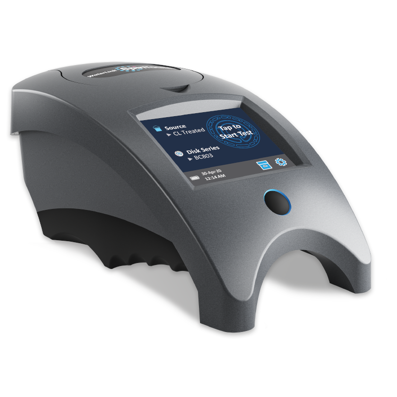 A sleek, gray electronic device, the WaterLink Spin Touch BC - 3586 features a touchscreen display with a visible menu and a blue circular button below the screen. Compact and modern, it’s designed for convenient desktop use.