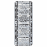 A blister pack labeled HARDNESS REAGENT, Code 4484, LaMotte TesTabs, with warnings stating the product is not considered hazardous by OSHA standards. Pills are visible underneath the packaging.