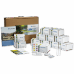 The AM-12 The TesTabs Water Investigation Kit - 5849 features labeled boxes for various tests, two sample tubes, a color chart, test tablets, and a handbook—all neatly arranged in front of a brown carrying case.