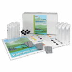 The Watershed Tour - 5974 science kit includes test tubes, small containers with black lids, an instruction booklet, illustrated cards, and testing tablets, all neatly displayed on a white surface.