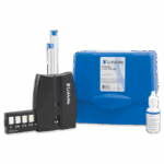 The Copper Test Kit - 6616-01 features a blue carrying case, two test tubes, a black comparator block, a bottle of test solution, and a color comparison chart for accurate low-range copper testing.