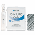 The Cyanuric Acid Test Kit - 6838 by LaMotte includes a transparent measuring tube, a test kit case labeled Cyanuric Acid Test Kit, and a sealed foil packet with test tablets.