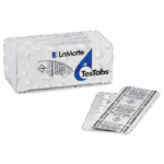 A white box labeled LaMotte TesTabs with a blue water drop graphic is next to a foil blister pack containing round tablets used for testing calcium hardness in water.