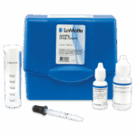 The Acidity Test Kit - 7182-01 features a blue plastic case, a clear measuring tube, a dropper, and two reagent bottles labeled phenolphthalein solution and sodium hydroxide solution.