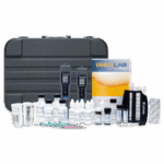 A comprehensive BrewLab Pro - 7190 beer water testing kit is displayed, including a black carrying case, digital meters, labeled solution bottles, syringes, test strips, a test tube, and an instruction booklet featuring a beer image on the cover.