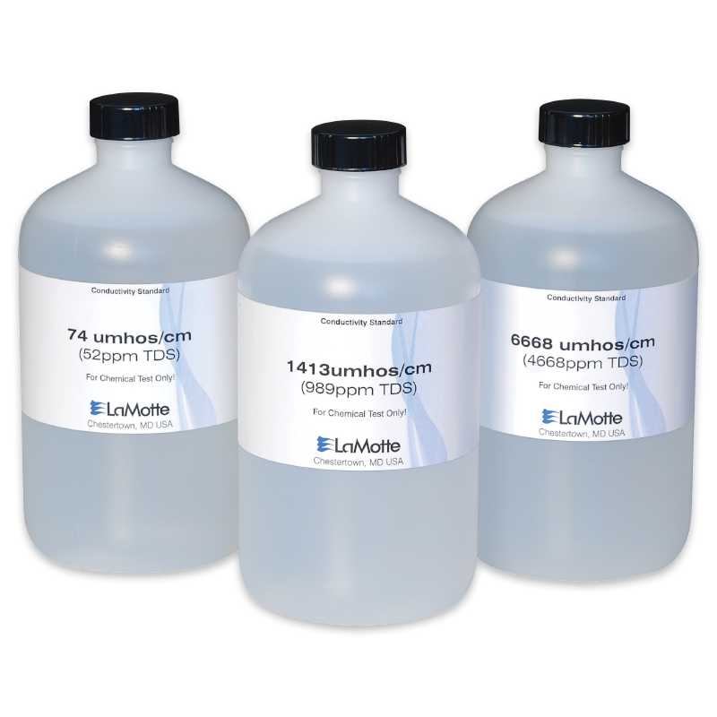 Three clear plastic bottles labeled as conductivity standards—74, 1413, and 6668 umhos/cm—with white labels and black caps. These LaMotte bottles are part of the Conductivity TDS Solutions 6417-L set for precise chemical testing.