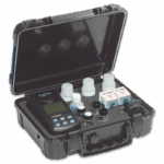 Open black carrying case containing a TC3000i BLE Meter - 1976-I, reagent bottles, vials, and other accessories, all arranged neatly inside foam compartments for a portable water testing kit.